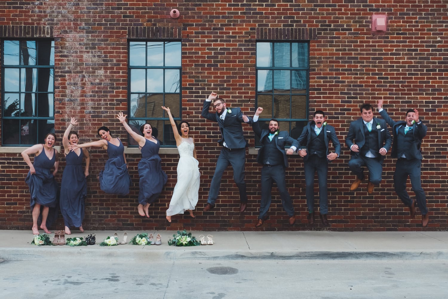 Isabel Orozco Moore and John Moore wedding party in Film Row in Oklahoma City // Photo by Leia Smethurst