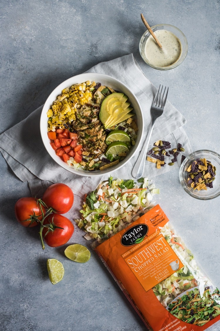 A bright, fresh Mexican Chimichurri Chicken Salad featuring grilled corn, summer tomatoes, marinated and grilled chimichurri chicken and creamy avocados. (gluten free)