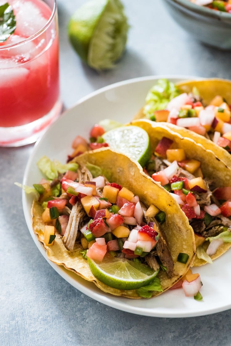 These Slow Cooker Pork Rib Tacos are seasoned with Mexican spices and cooked in orange juice for a delicious and easy weeknight meal! (gluten free)
