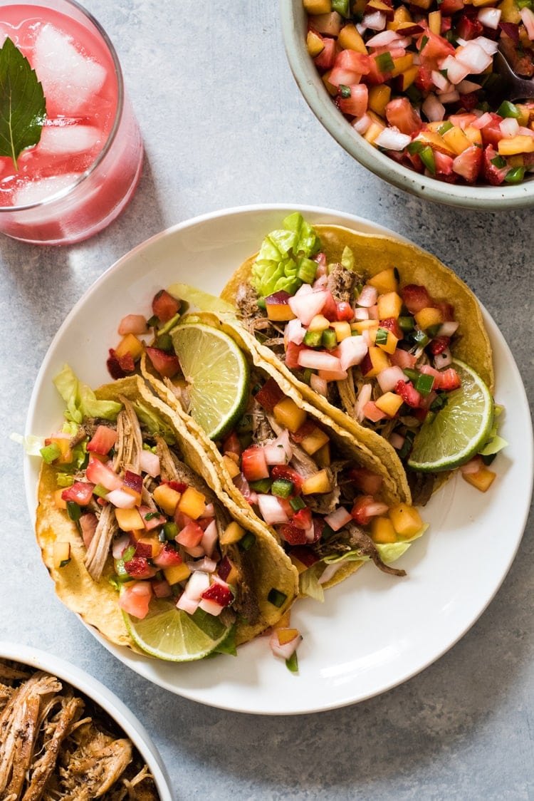 These Slow Cooker Pork Rib Tacos are seasoned with Mexican spices and cooked in orange juice for a delicious and easy weeknight meal! (gluten free)