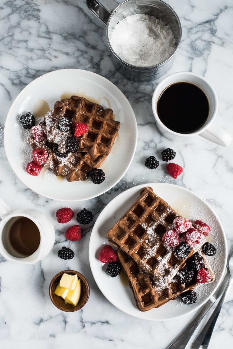 Made with a hint of cinnamon and adobo chili powder, these Chili Chocolate Waffles topped with fresh berries, powdered sugar and maple syrup are a brunch delight!