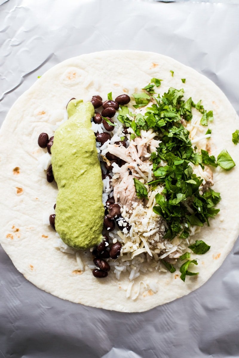 These Roasted Poblano Chicken Burritos are an easy Mexican lunch or dinner recipe that's perfect for weekend meal prep. They're also freezer friendly!