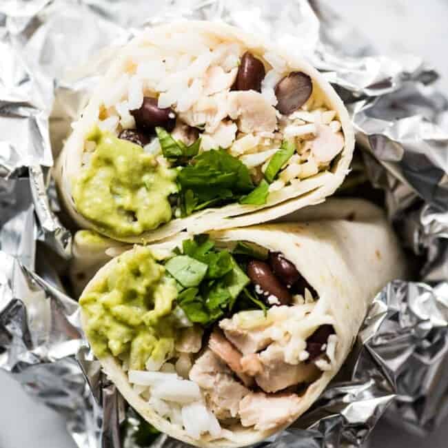 These Roasted Poblano Chicken Burritos are an easy Mexican lunch or dinner recipe that's perfect for weekend meal prep. They're also freezer friendly!