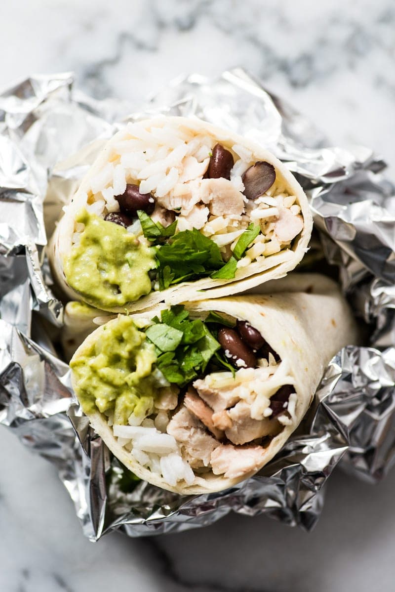 These Roasted Poblano Chicken Burritos are an easy Mexican lunch or dinner recipe that's perfect for weekend meal prep. They're also freezer friendly!