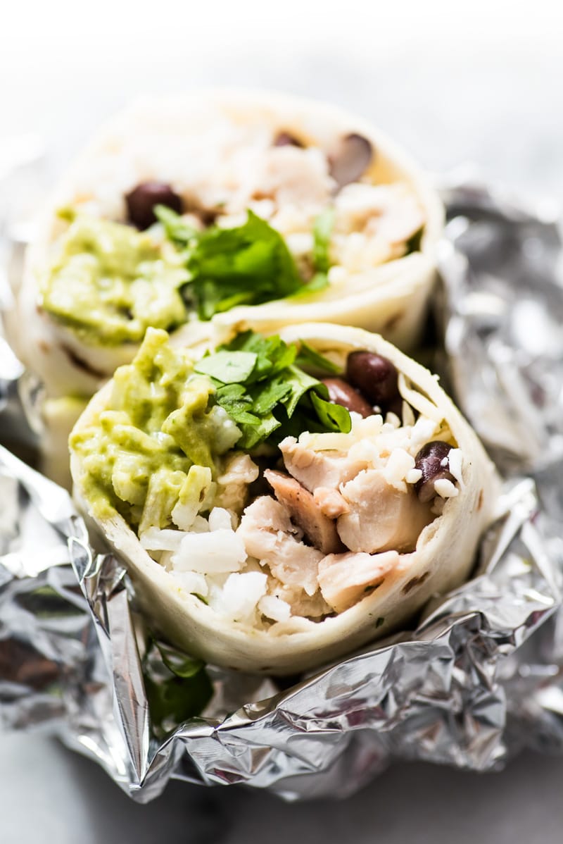 These Roasted Poblano Chicken Burritos are an easy Mexican lunch or dinner recipe that's perfect for weekend meal prep. They're also freezer friendly!