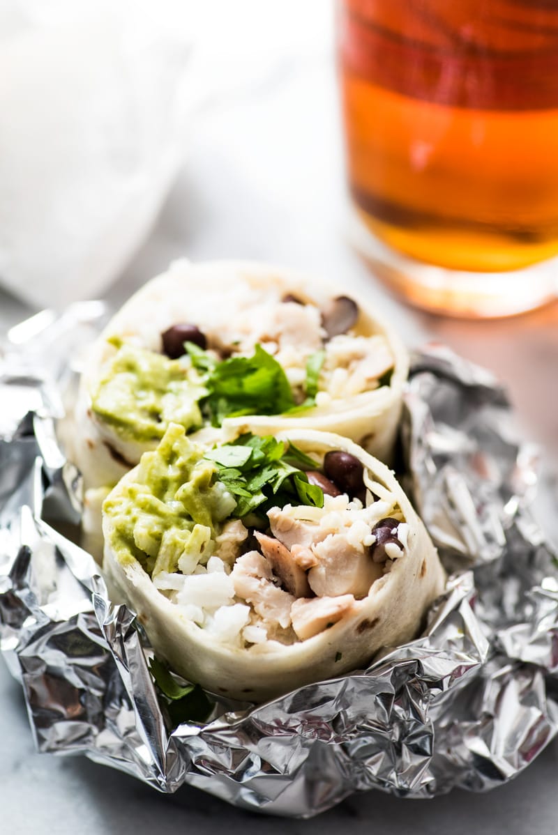 These Roasted Poblano Chicken Burritos are an easy Mexican lunch or dinner recipe that's perfect for weekend meal prep. They're also freezer friendly!
