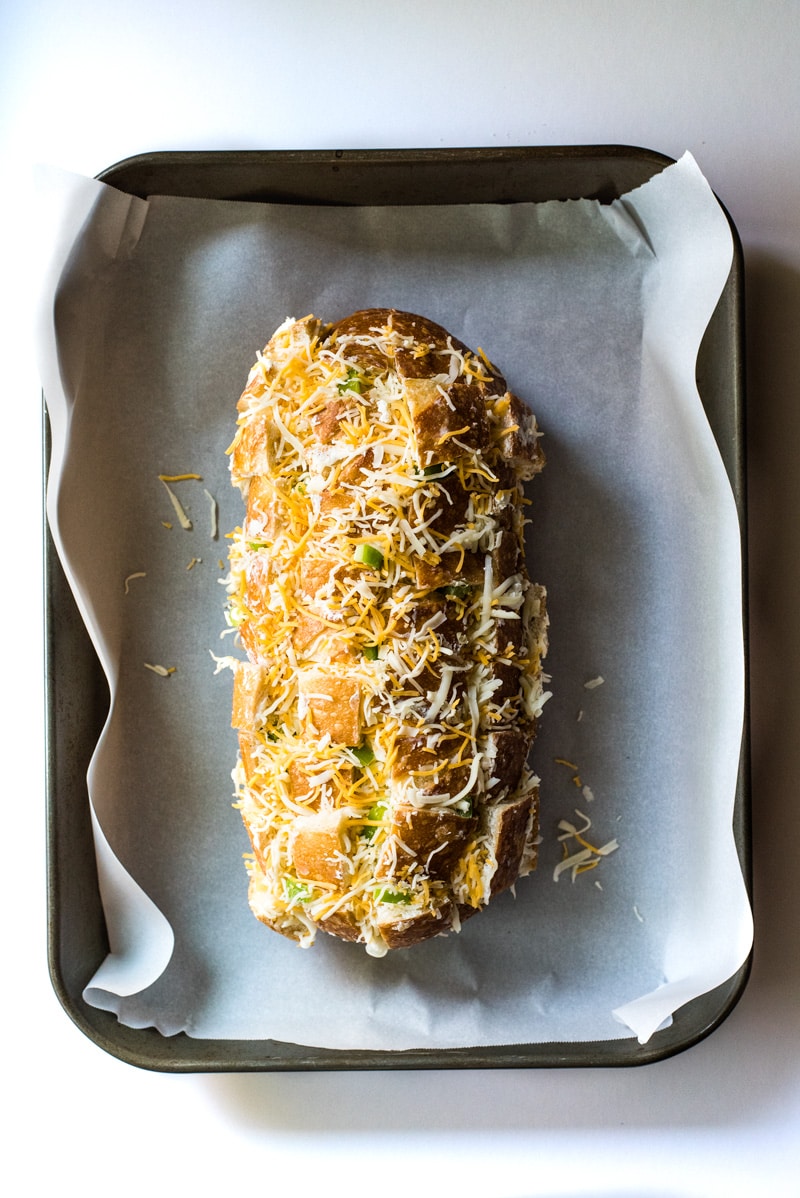 Cheesy, spicy and fun to eat, this Jalapeno Popper Pull Apart Bread is the perfect game day appetizer that's easy to make and ready in 35 minutes!