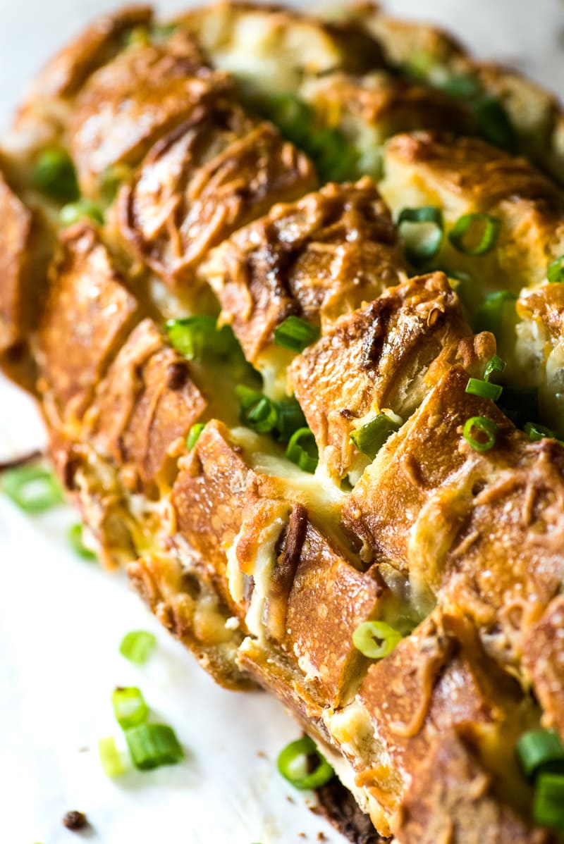 Cheesy, spicy and fun to eat, this Jalapeno Popper Pull Apart Bread is the perfect game day appetizer that's easy to make and ready in 35 minutes!