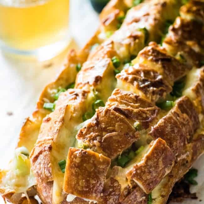 Cheesy, spicy and fun to eat, this Jalapeno Popper Pull Apart Bread is the perfect game day appetizer that's easy to make and ready in 35 minutes!