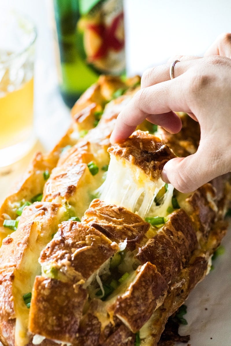 Cheesy, spicy and fun to eat, this Jalapeno Popper Pull Apart Bread is the perfect game day appetizer that's easy to make and ready in 35 minutes!