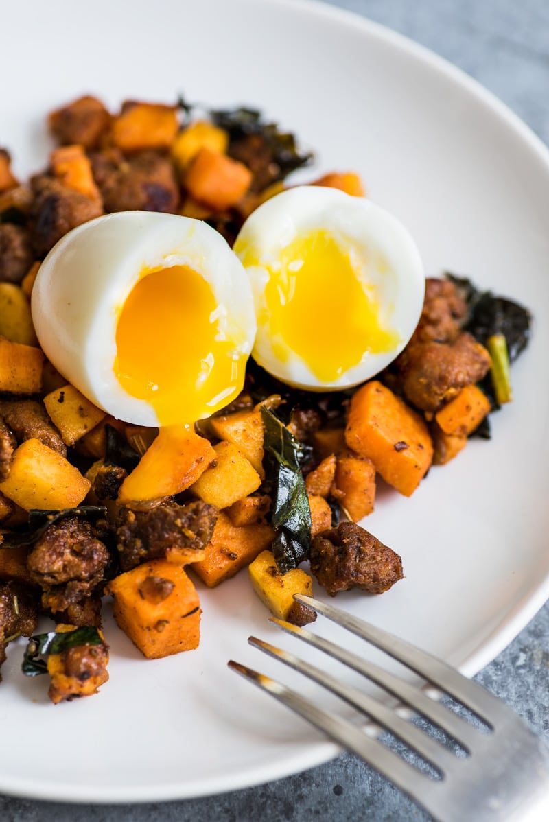 This Mexican Chorizo Sweet Potato Hash with Soft Boiled Eggs is a healthy, filling and comforting meal made with sweet potatoes, Mexican chorizo, kale and Granny Smith apples. It's also gluten free and paleo friendly.