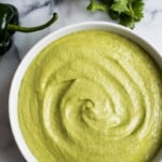 A Mexican favorite, this Easy Roasted Poblano Cream Sauce is loaded with flavor and goes well on tacos, burritos, enchiladas and more! (gluten free)