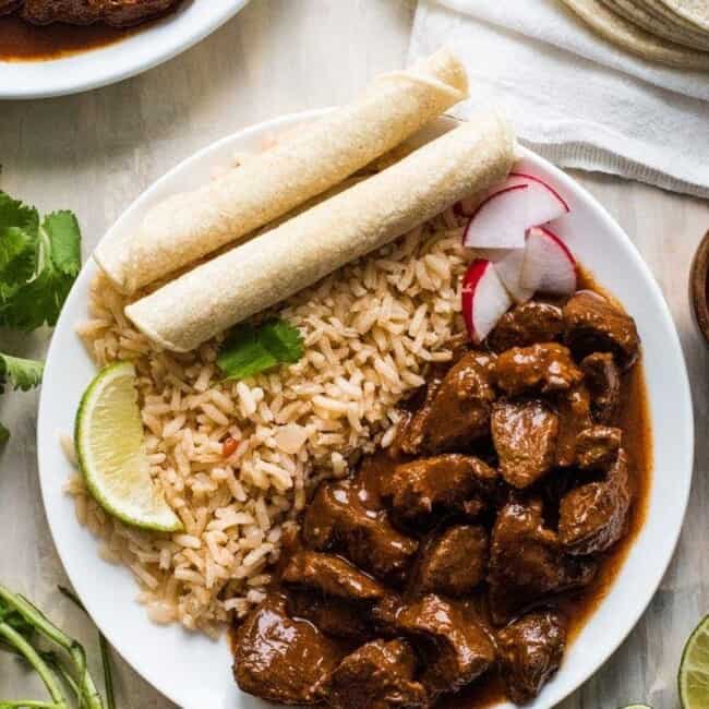 This Chile Colorado recipe combines tender pieces of beef with a rich and flavorful red chile sauce. Serve with rice for an authentic Mexican dinner!