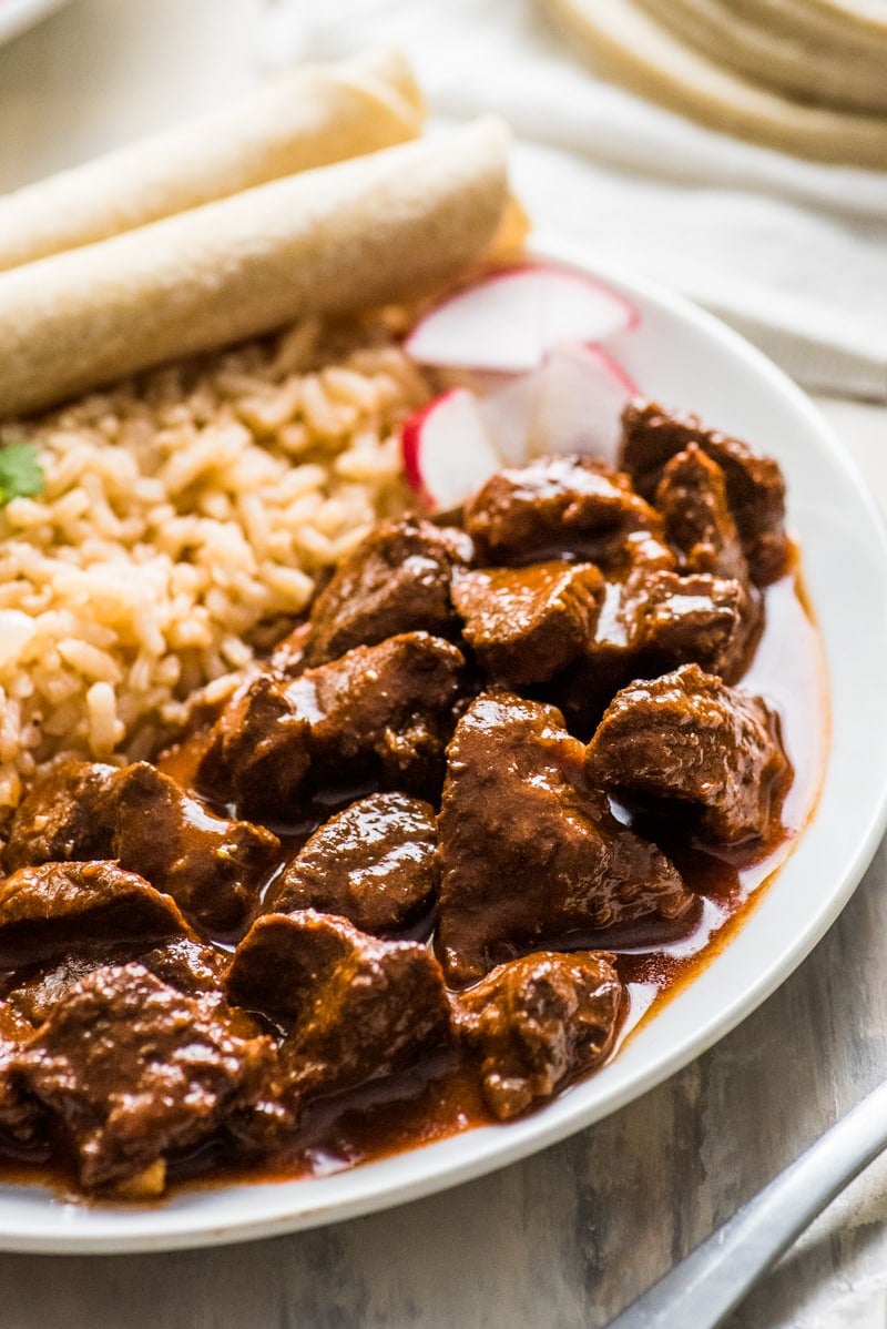 This Chile Colorado recipe combines tender pieces of beef with a rich and flavorful red chile sauce. Serve with rice for an authentic Mexican dinner!