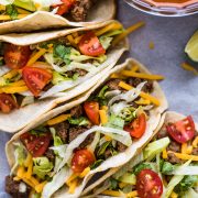 This Easy Ground Beef Tacos recipe made with a homemade taco seasoning packs a ton of flavor for a delicious weeknight meal ready in under 30 minutes!