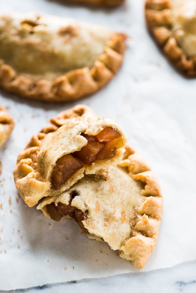 Baked Apple Empanadas are the perfect dessert for the fall and winter seasons! They're portable, delicious and super addicting.