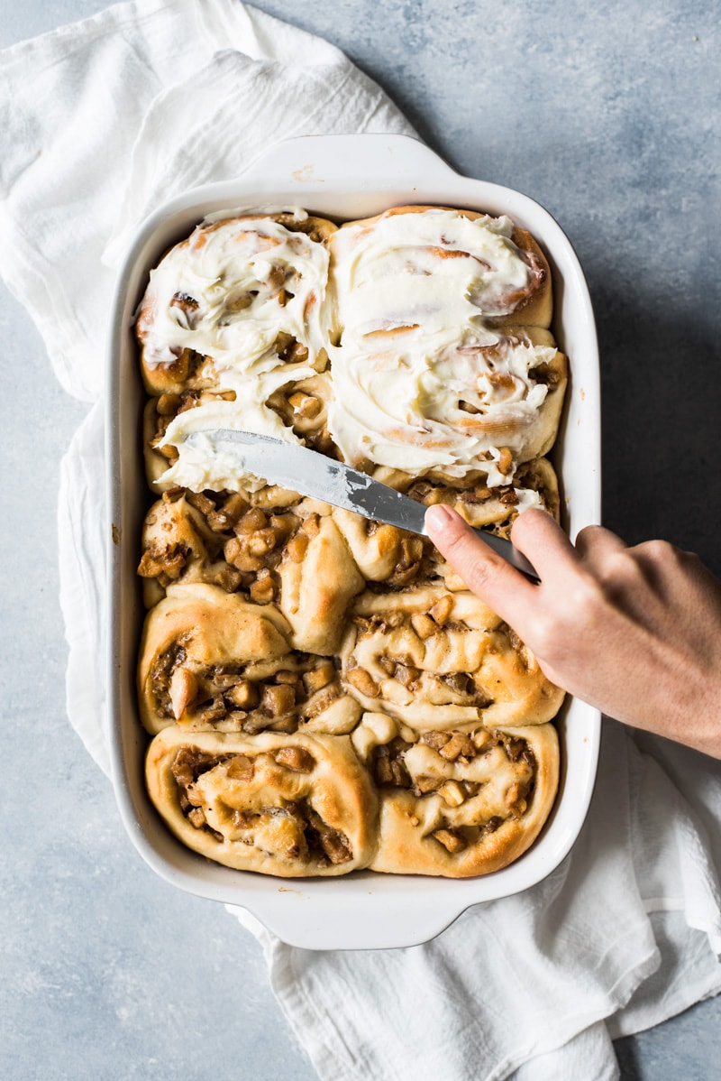 These Dulce de Leche Cinnamon Rolls stuffed with apples and pecans are the perfect fall and winter treat made with a Mexican twist!