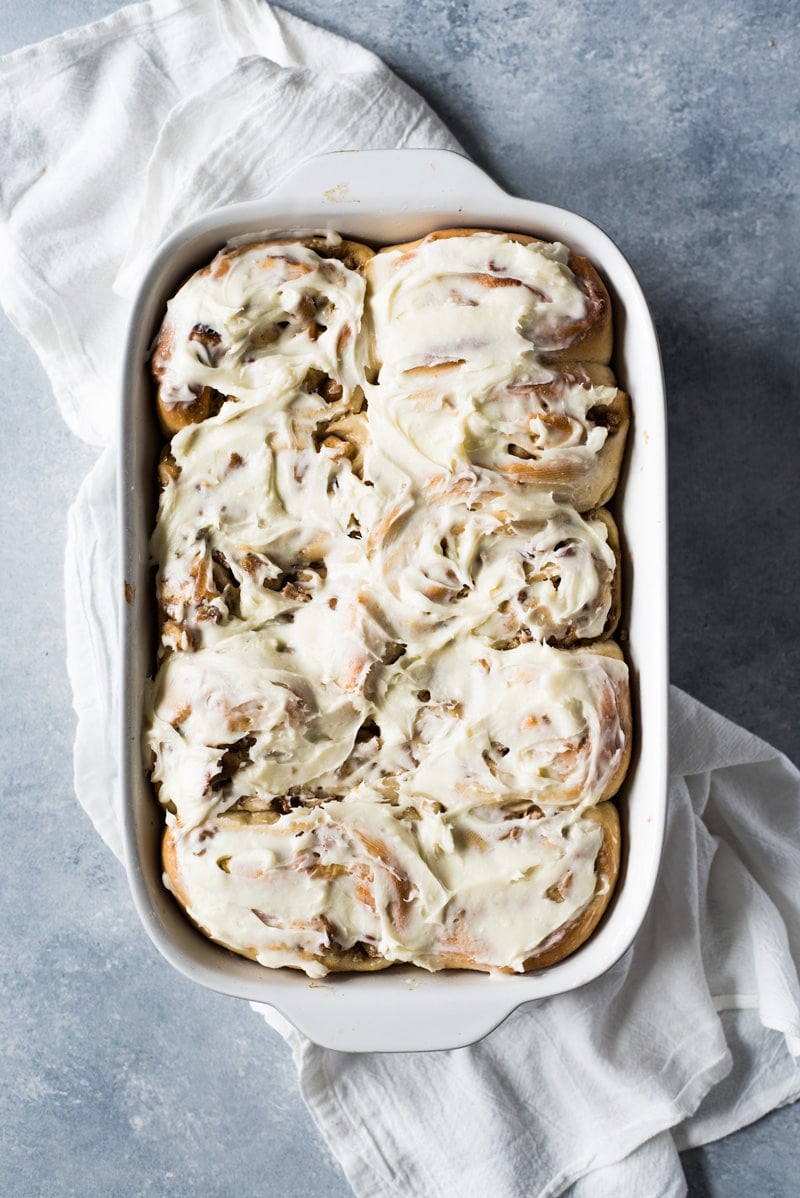 These Dulce de Leche Cinnamon Rolls stuffed with apples and pecans are the perfect fall and winter treat made with a Mexican twist!