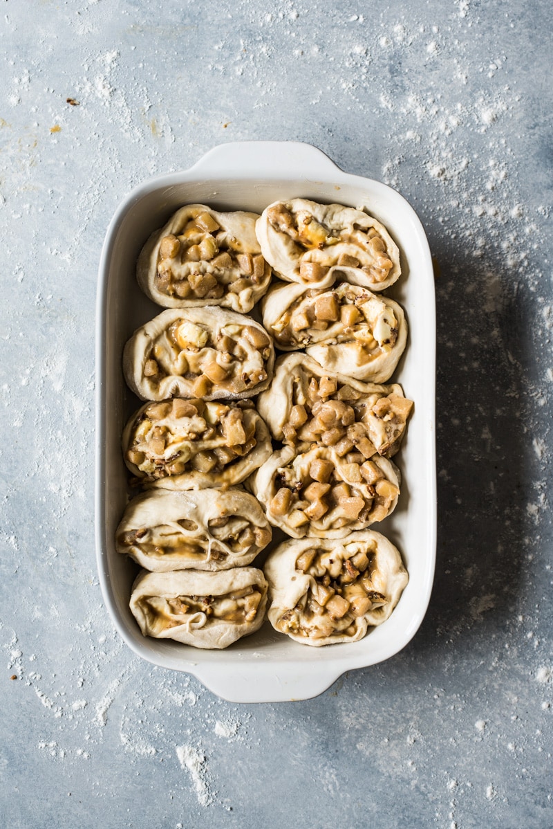 These Dulce de Leche Cinnamon Rolls stuffed with apples and pecans are the perfect fall and winter treat made with a Mexican twist!