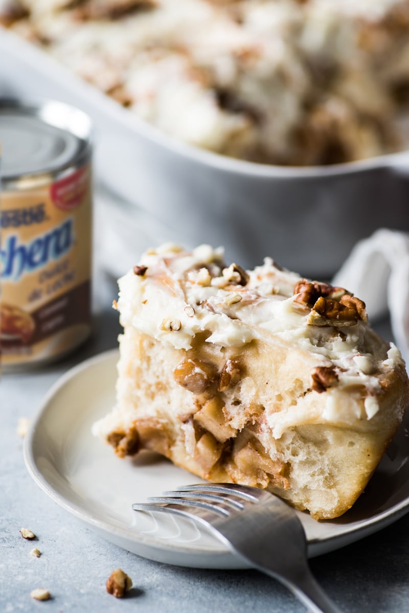 These Dulce de Leche Cinnamon Rolls stuffed with apples and pecans are the perfect fall and winter treat made with a Mexican twist!