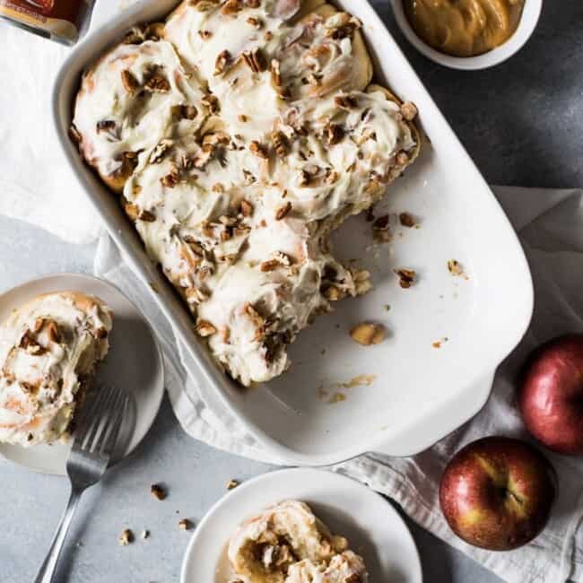 These Dulce de Leche Cinnamon Rolls stuffed with apples and pecans are the perfect fall and winter treat made with a Mexican twist!