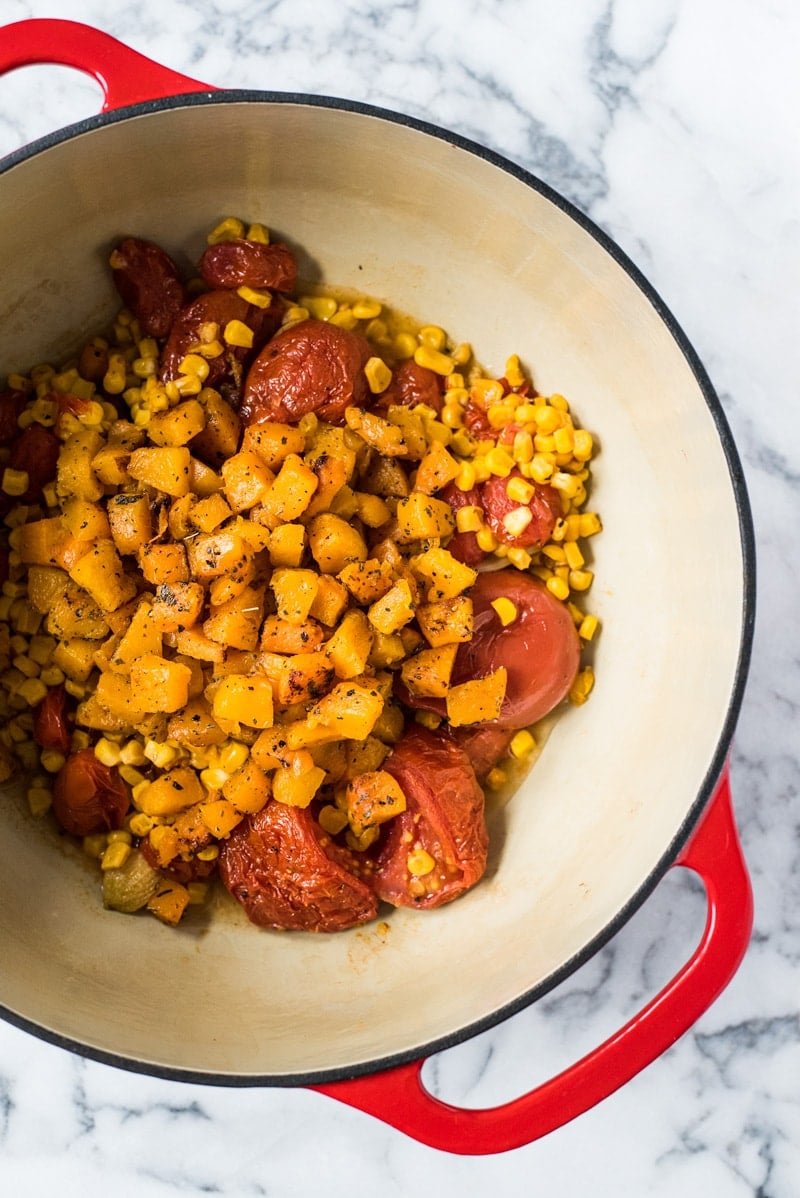 This Smoky Chipotle Tomato Bisque recipe is made with roasted butternut squash, corn and tomatoes for a healthy and comforting lunch and dinner. (gluten free, paleo, vegetarian, vegan)