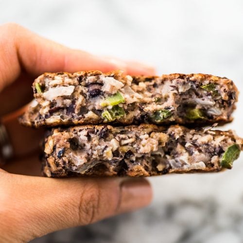 These Black Bean Patties are crispy on the outside, creamy on the inside and served with a cilantro yogurt sauce. Makes tasty black bean burgers! #vegetarian #blackbeanburger #veggieburger #blackbeans