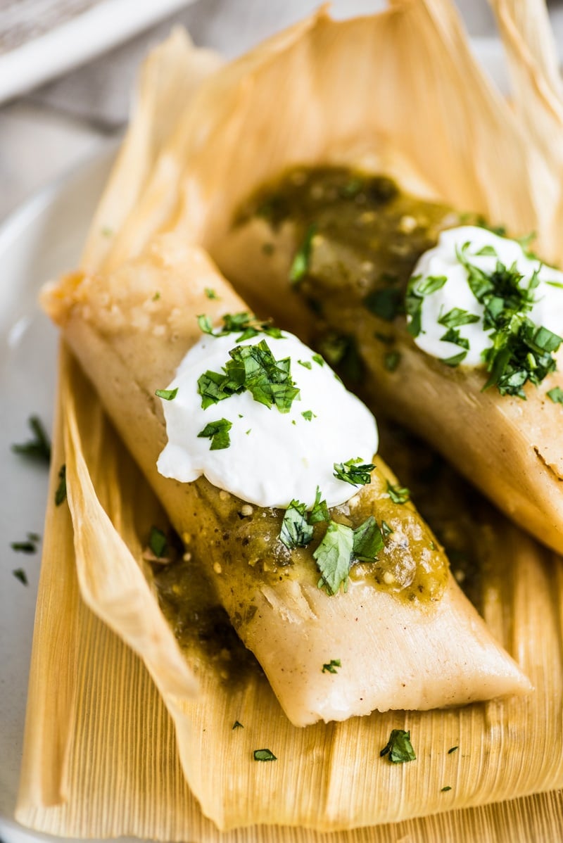 Tamales de Rajas (Vegetarian Tamales) on a plate ready to eat.