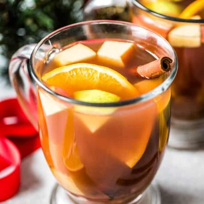 Mexican Ponche is a warm and comforting fruit punch made with apples, pears, oranges and guavas and spiced with cinnamon, cloves, tamarind and hibiscus typically served at Christmas time.