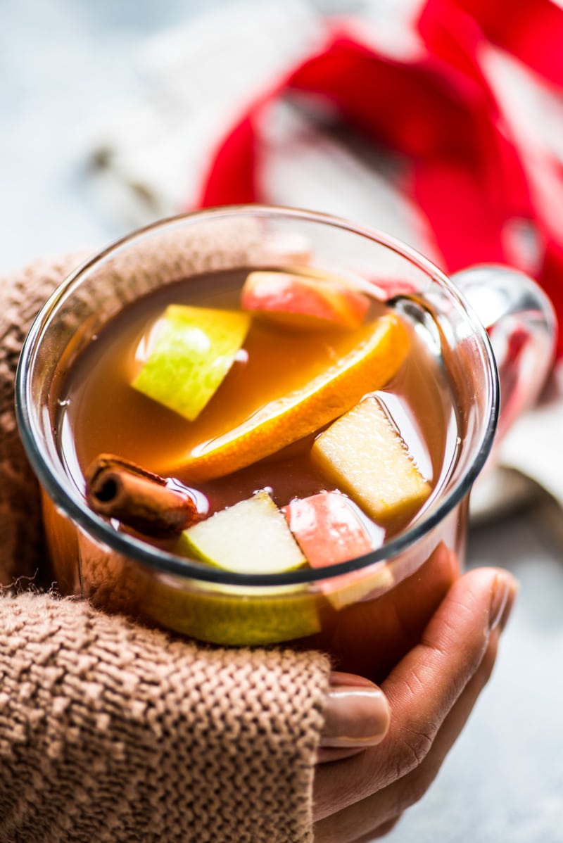 Mexican Ponche is a warm and comforting fruit punch made with apples, pears, oranges and guavas and spiced with cinnamon, cloves, tamarind and hibiscus typically served at Christmas time.
