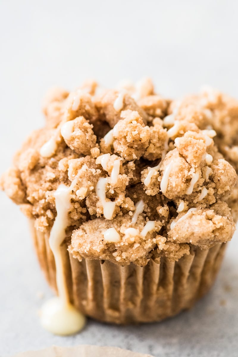 These cinnamon coffee cake muffins topped with a crunchy streusel topping are made with Greek yogurt for a healthier homemade treat!