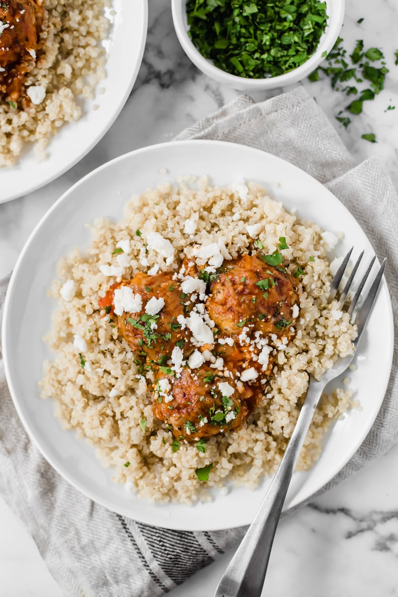 Gluten free chicken meatballs covered in a red enchilada sauce