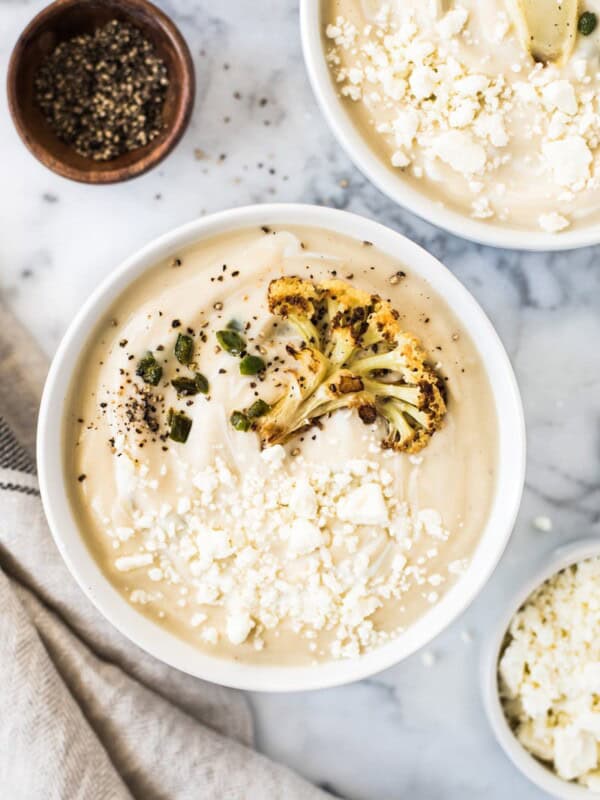 This Roasted Cauliflower Soup with Fried Jalapeños is thick, creamy and loaded with healthy veggies. It's also gluten free, paleo, vegetarian and vegan!