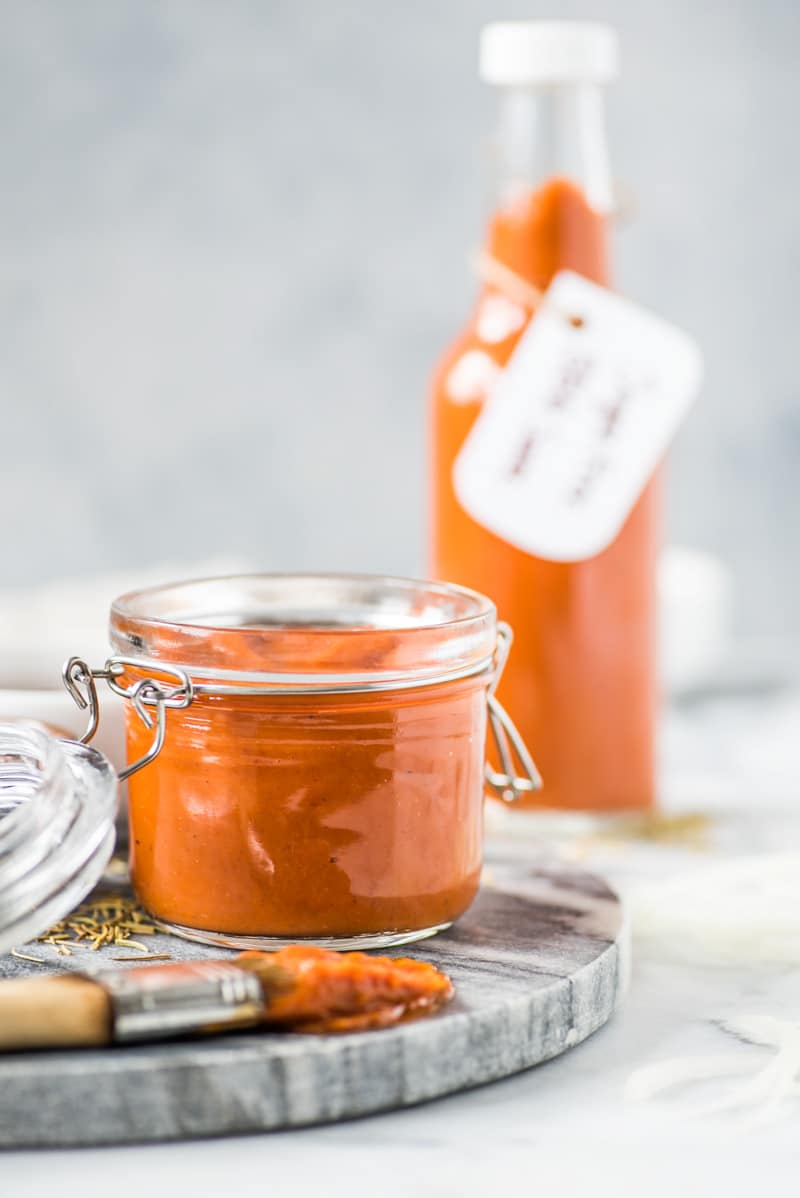 This homemade Sugar Free BBQ Sauce is made with chipotle peppers, caramelized onions and a blend of spices that's healthy, wholesome and insanely addicting! It's gluten free, dairy free, paleo, vegetarian and vegan. #bbqsauce #barbecue #sugarfree #bbq