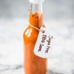 This homemade Sugar Free BBQ Sauce is made with chipotle peppers, caramelized onions and a blend of spices that's healthy, wholesome and insanely addicting! It's gluten free, dairy free, paleo, vegetarian and vegan. #bbqsauce #barbecue #sugarfree #bbq