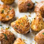 These Mexican Crispy Roasted Potatoes seasoned with chili powder, garlic, sea salt and Parmesan cheese are baked, not fried and are the perfect side to weekday meals. (gluten free, vegetarian)