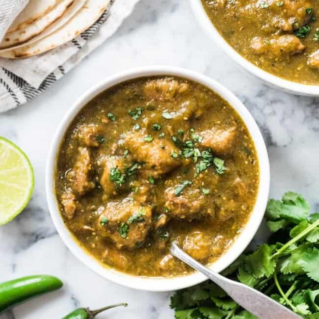 This Mexican Pork Chile Verde is made of tender pieces of pork simmered in a flavorful tomatillo and chile broth. Serve in a bowl or with a side of rice for an authentic Mexican meal! (low carb, gluten free, paleo)
