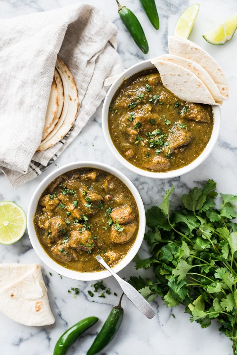 This Mexican Pork Chile Verde is made of tender pieces of pork simmered in a flavorful tomatillo and chile broth. Serve in a bowl or with a side of rice for an authentic Mexican meal! (low carb, gluten free, paleo)