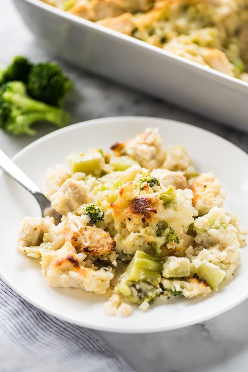 This low carb and cheesy Broccoli Cauliflower Rice Chicken Casserole recipe is perfect for dinner and makes great leftovers. It's also gluten free!