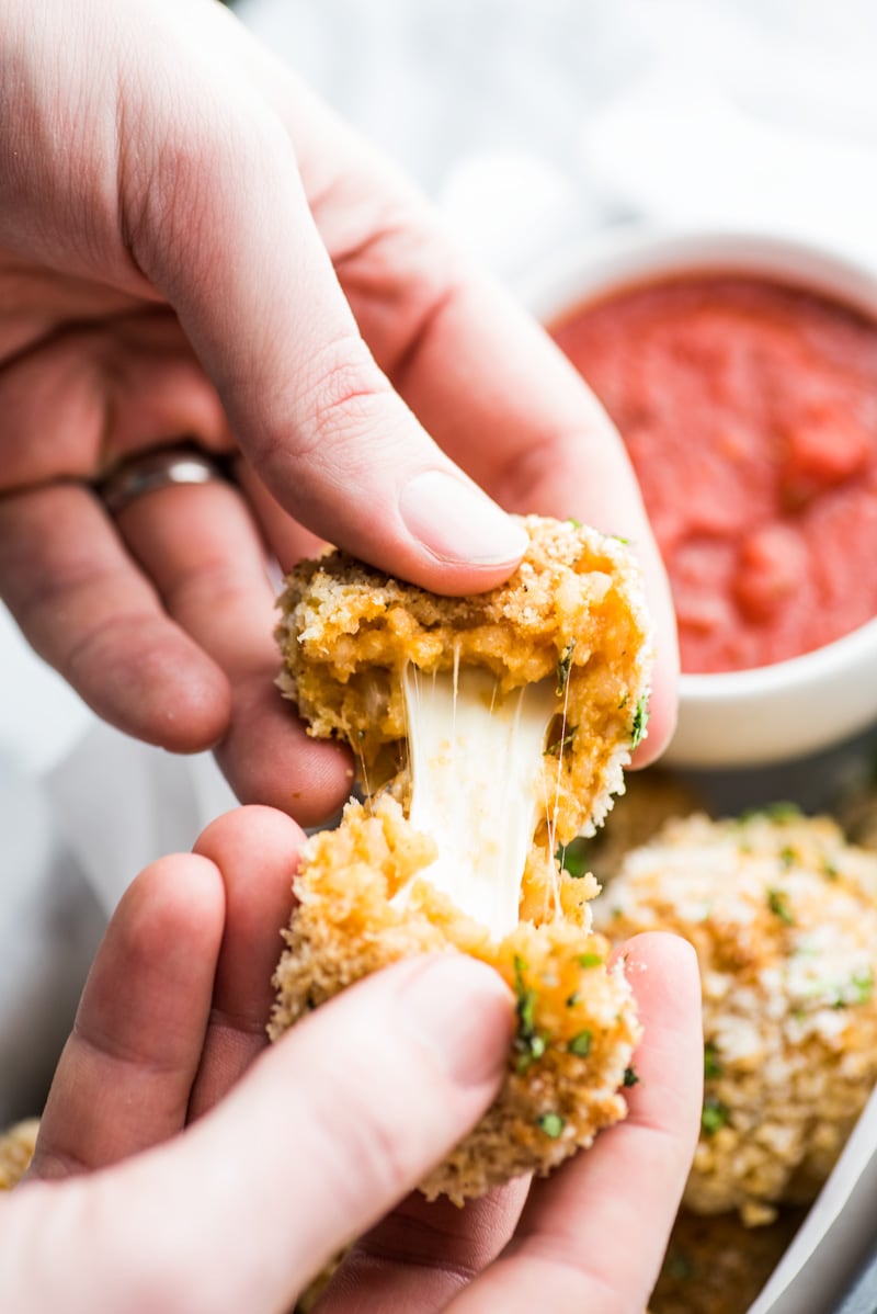 These arancini balls are filled with Mexican inspired rice, mozzarella cheese and covered in crispy panko breadcrumbs. They're baked, not fried, for a healthier option.