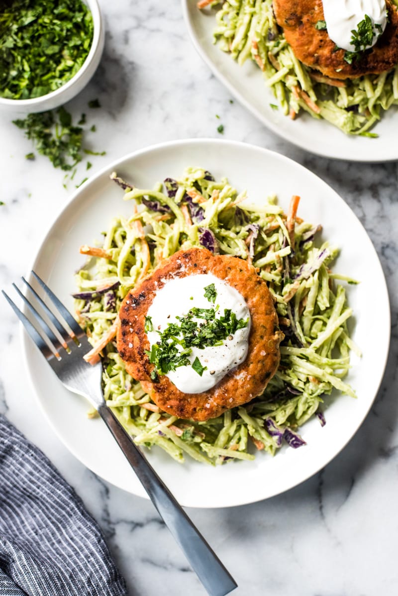 These jalapeno salmon patties are quick and easy to make and are the best healthy dinner paired with an avocado broccoli slaw. (low carb, gluten free, paleo)