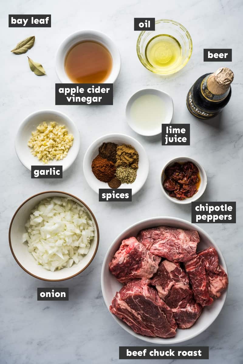 Barbacoa ingredients in individual containers ready to cook.