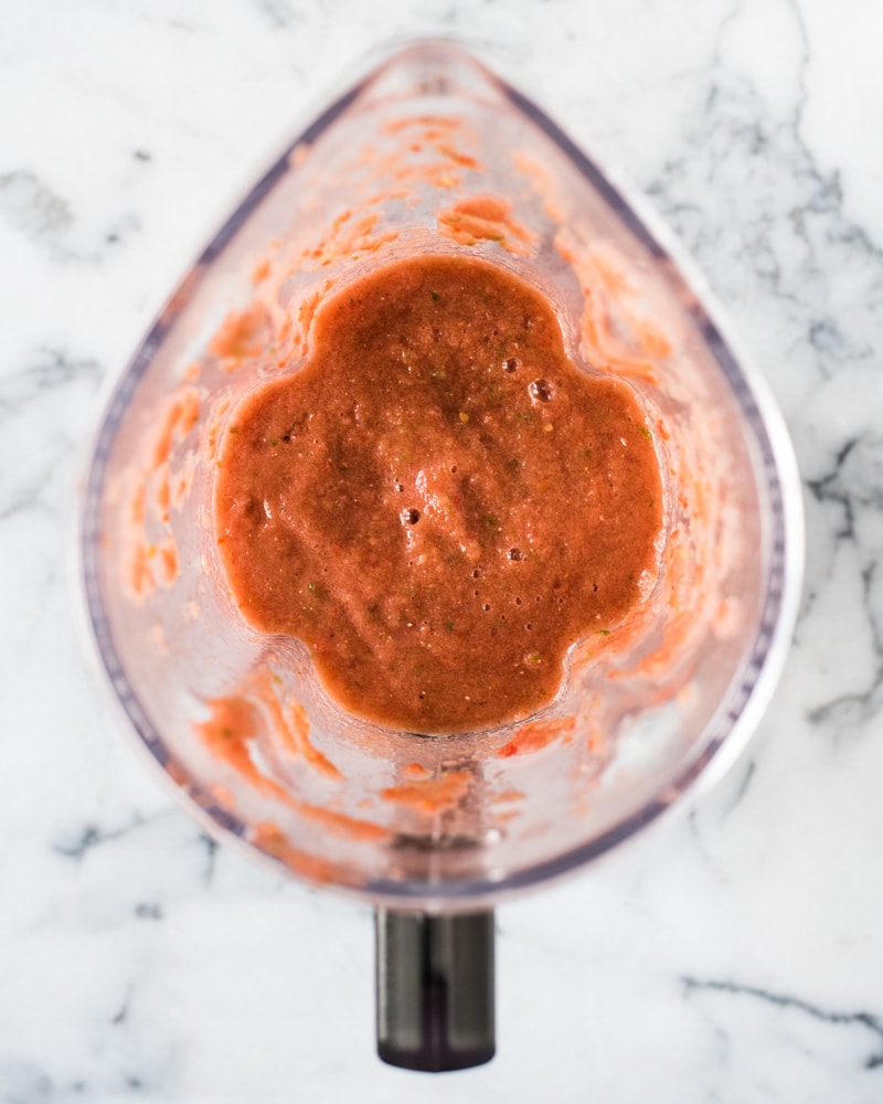 Tomato sauce mixture for picadillo in a blender.
