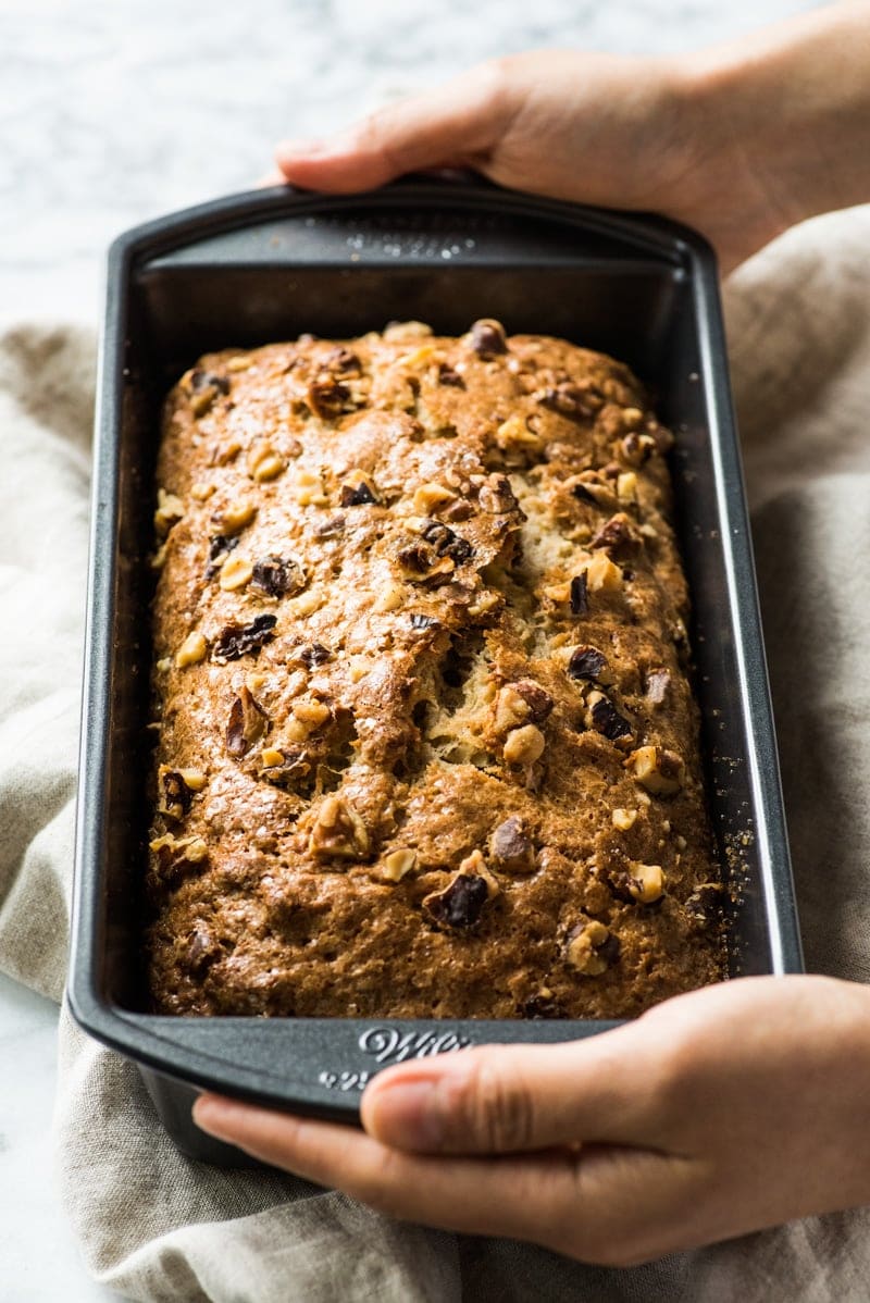 This Cinnamon Banana Nut Bread recipe is easy to make and creates a moist and delicious loaf that's perfect for breakfast or dessert.