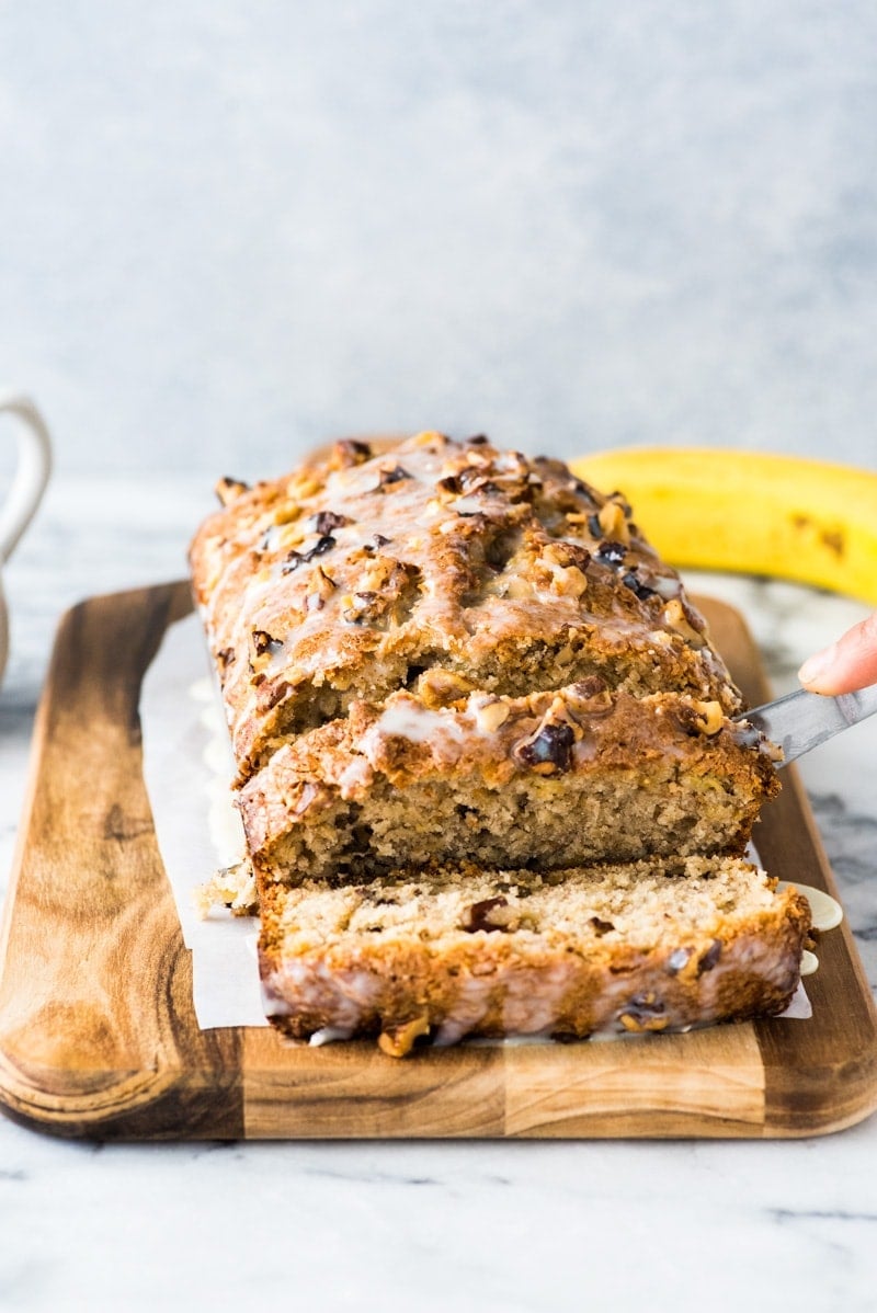 This Banana Walnut Bread recipe is easy to make and creates a moist and delicious loaf that's perfect for breakfast or dessert.