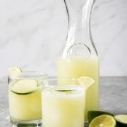 Cucumber Agua Fresca (also called Agua de Pepino) is made with refreshing cucumber, a spritz of lime juice, a touch of sugar and ice cold water. Perfect on a hot summer day!