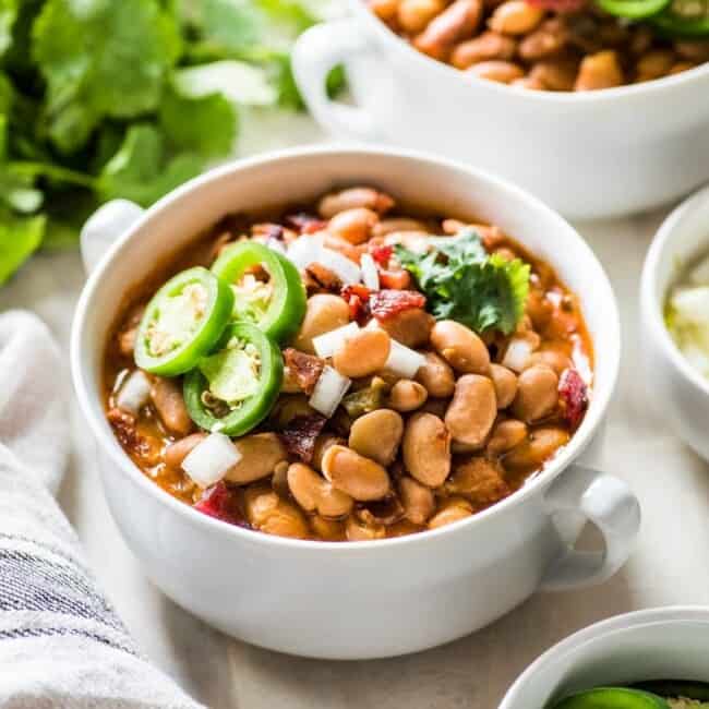 Charro Beans (frijoles charros) in a white bowl.