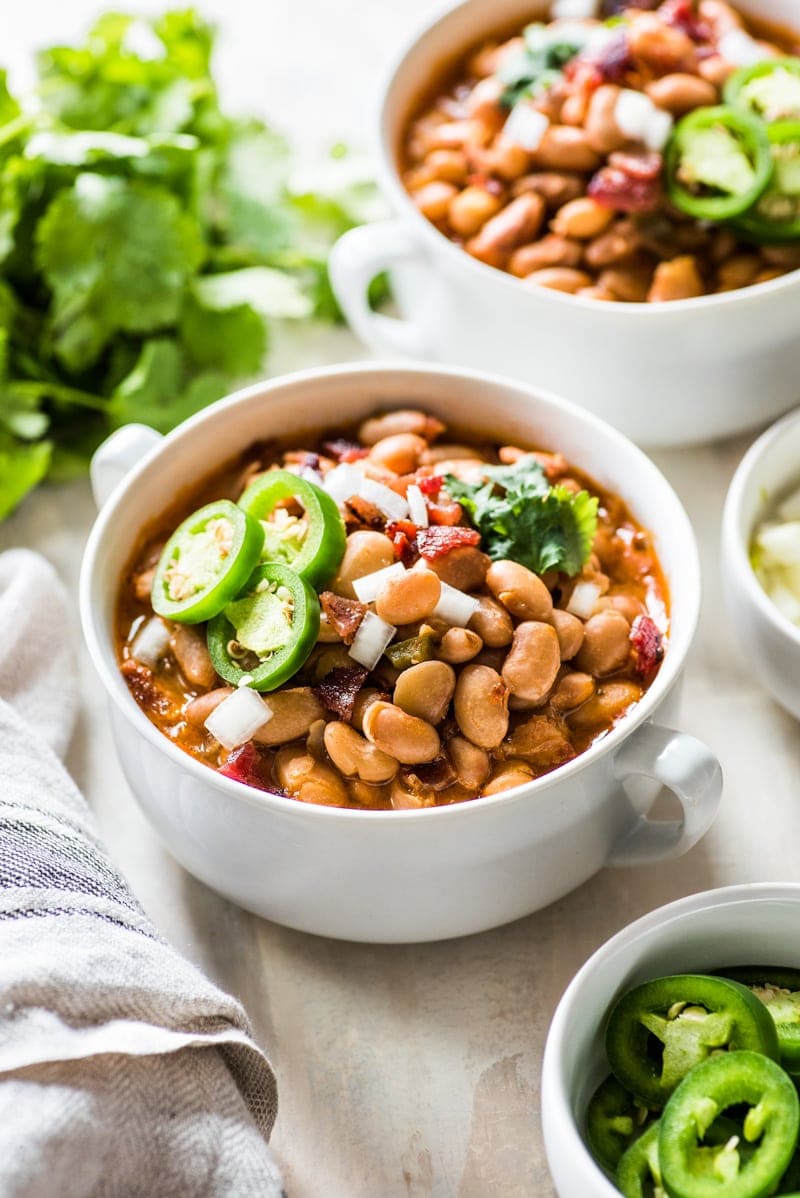 Charro Beans (Frijoles Charros) in a white bowl.