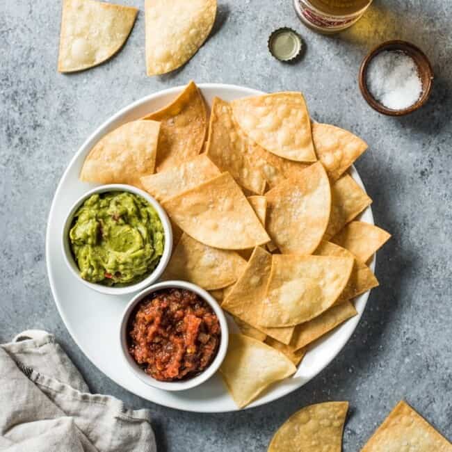These Homemade Tortilla Chips are the perfect Mexican appetizer. They’re crispy, crunchy and won’t crumble and fall apart when dipping and snacking!