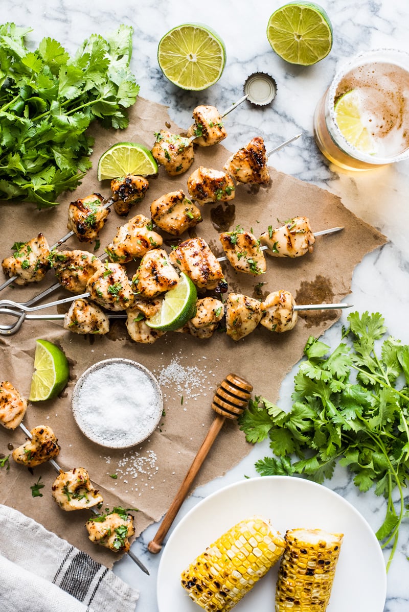 These easy Chicken Kabobs brushed with a honey lime sauce are juicy, tender and flavorful. No more dry or rubbery chicken! (gluten free, paleo)